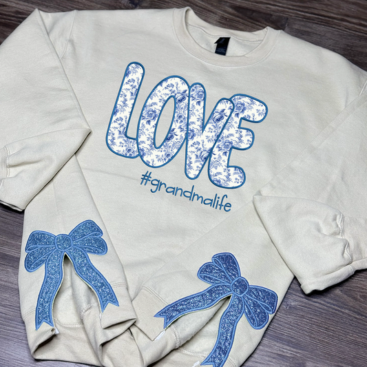 Custom Name Love Grandma Life, Glitter Christmas Bow Embellished Sweatshirt – Custom Side Bow Cut-Out Sweatshirt