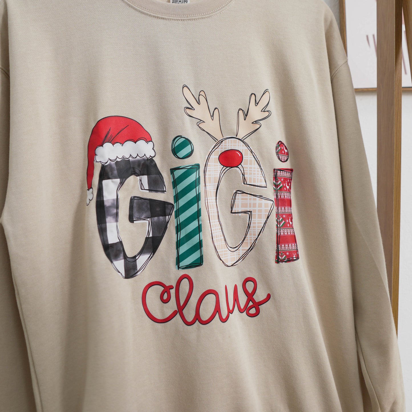 Custom Christmas Gigi Claus Sweatshirt, 2024 Christmas Nana Sweatshirt, Custom Grandma Claus Christmas Sweatshirt Sweatshirt