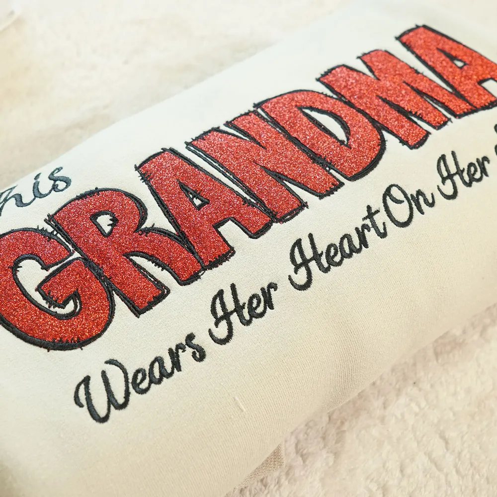 Personalized 'This Grandma Wears Her Heart On Her Sleeve' Sweatshirt with Side Bow, Heartfelt Gift for Mom & Grandma