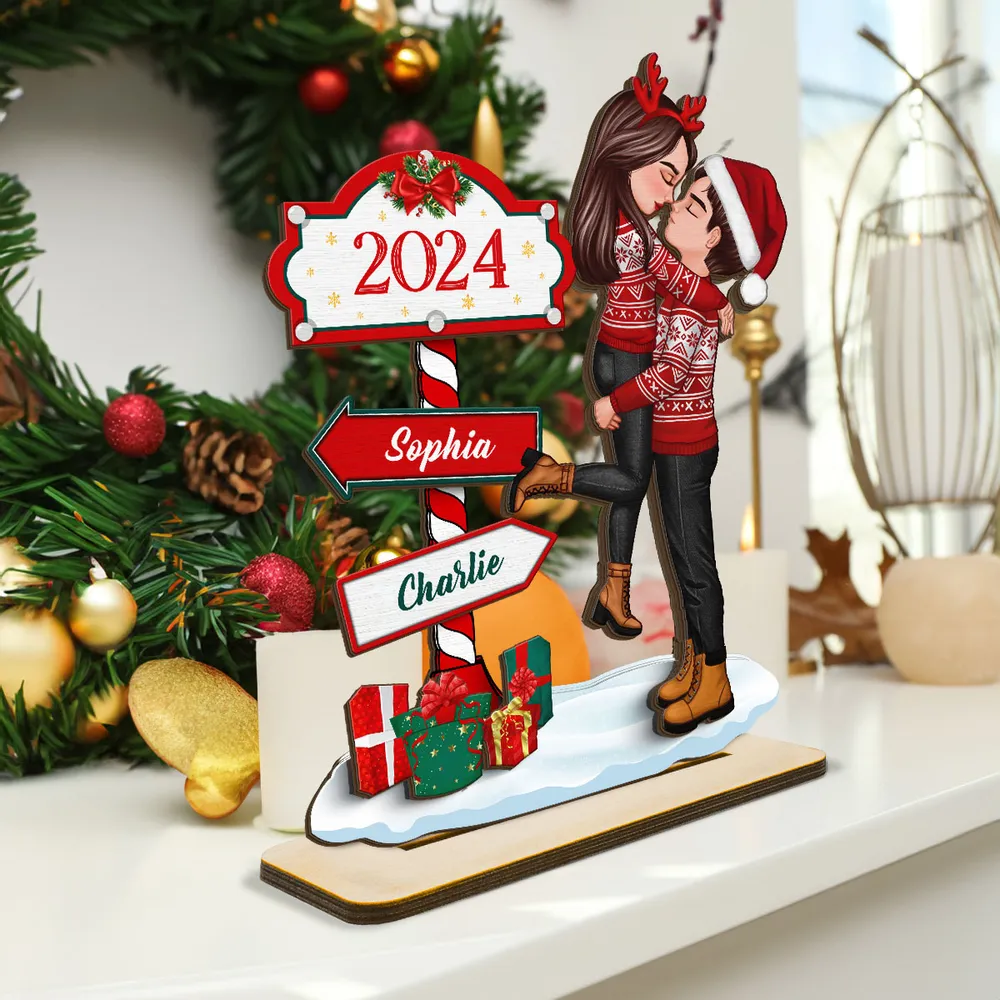 Couple Hugging Kissing North Pole Sign Christmas Decor - Personalized Wooden Plaque