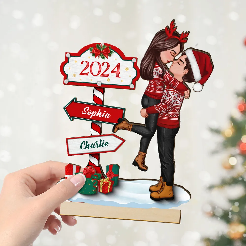 Couple Hugging Kissing North Pole Sign Christmas Decor - Personalized Wooden Plaque