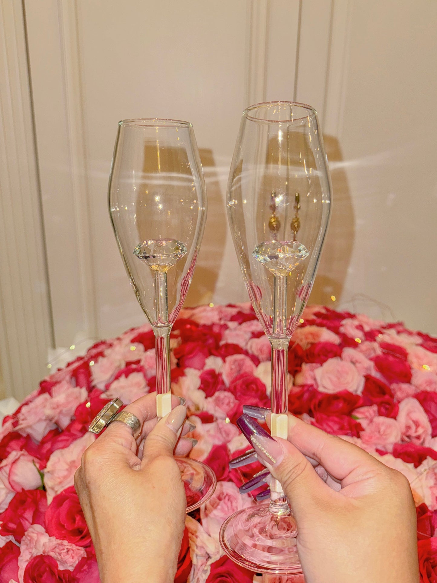 The ‘100-Carat’ Diamond Champagne Flute Set of 2 displayed at a wedding.