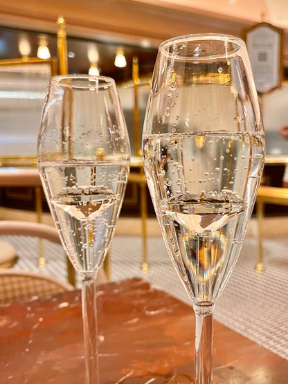 ‘100-Carat’ Diamond Champagne Flute Set of 2 in an upscale restaurant.