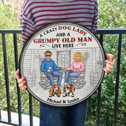 Family Couple A Lovely Lady And Her Grumpy Old Man Live Here With Their Crazy Dogs - Gift For Dog Lovers - Personalized Custom Wood Circle Sign