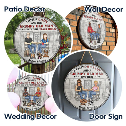 Family Couple A Lovely Lady And Her Grumpy Old Man Live Here With Their Crazy Dogs - Gift For Dog Lovers - Personalized Custom Wood Circle Sign