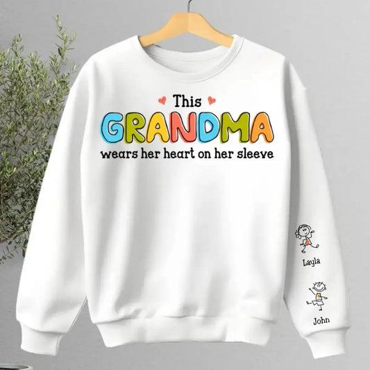 Kids - This Grandma Wears Her Heart On Her Sleeve - Personalized Unisex Sweatshirt Shirts & Tops The Next Custom Gift