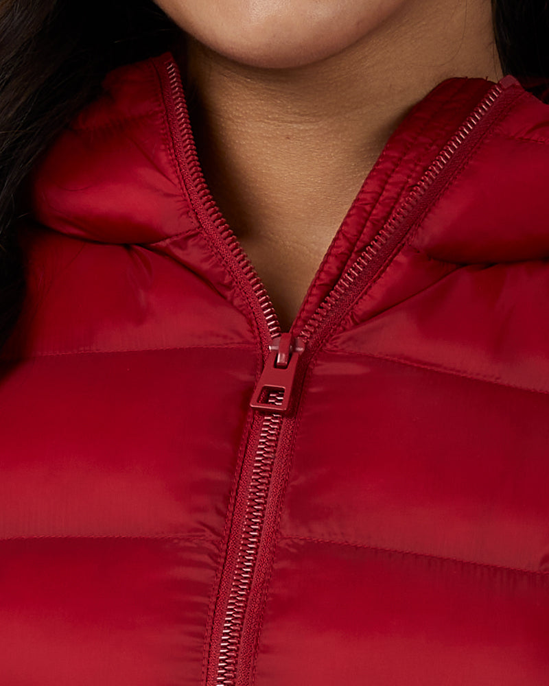 32 Degrees Chili Pepper _ Women's Poly-Fill Hooded Packable Jacket {model: Ria is 5'8", wearing size S}{bottom}{right} {bottom}{right}