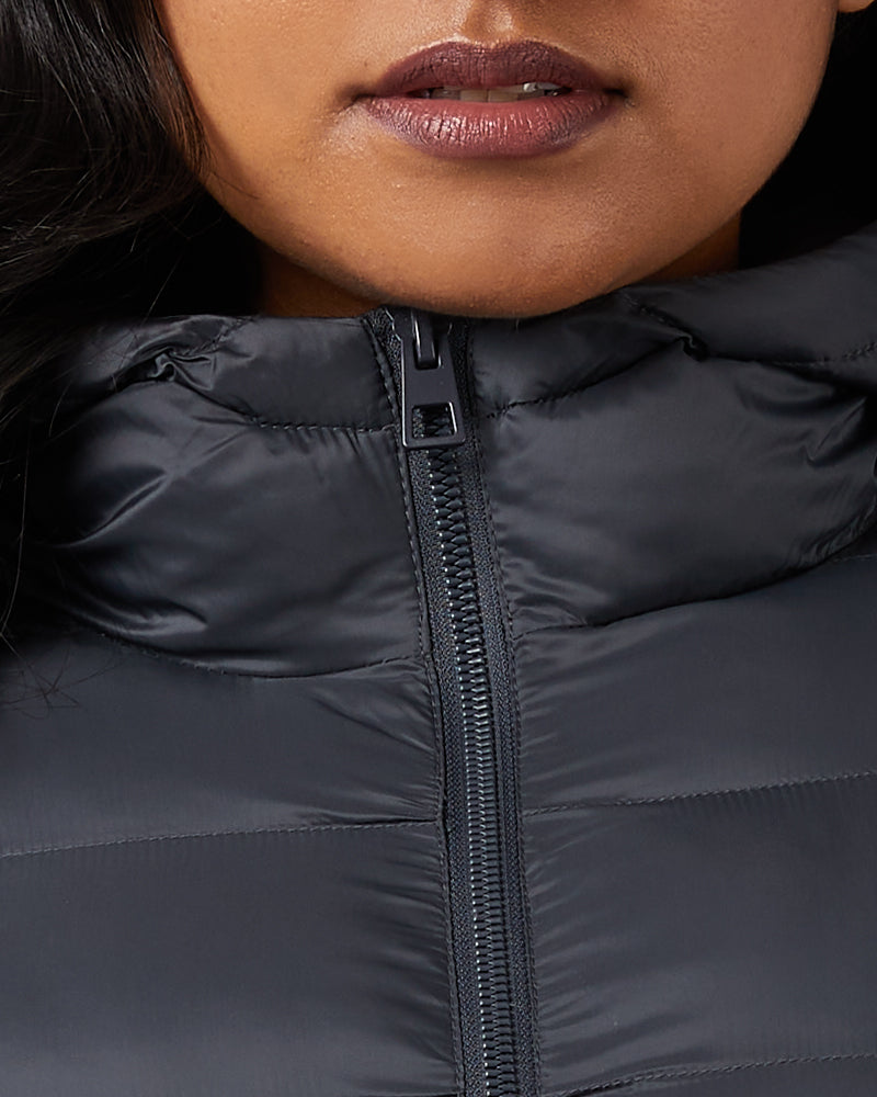 32 Degrees Dark Shadow _ Women's Poly-Fill Hooded Packable Jacket {model: Nikita is 5'10", wearing size L}{bottom}{right} {bottom}{right}