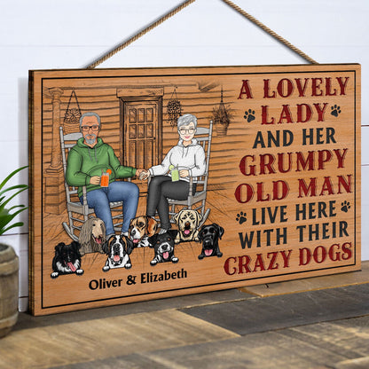 A Lovely Lady And A Grumpy Old Man Live Here With Their Crazy Dogs - Outdoor, Home Decor Gift For Family, Couple, Pet Lovers - Personalized Custom Wood Rectangle Sign