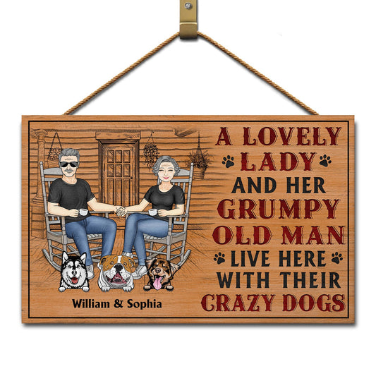 A Lovely Lady And A Grumpy Old Man Live Here With Their Crazy Dogs - Outdoor, Home Decor Gift For Family, Couple, Pet Lovers - Personalized Custom Wood Rectangle Sign