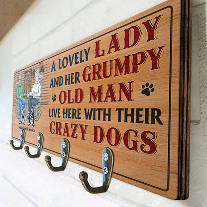 A Lovely Lady And A Grumpy Old Man Live Here With Their Crazy Dogs - Outdoor, Home Decor Gift For Family, Couple, Pet Lovers - Personalized Custom Wood Key Holder