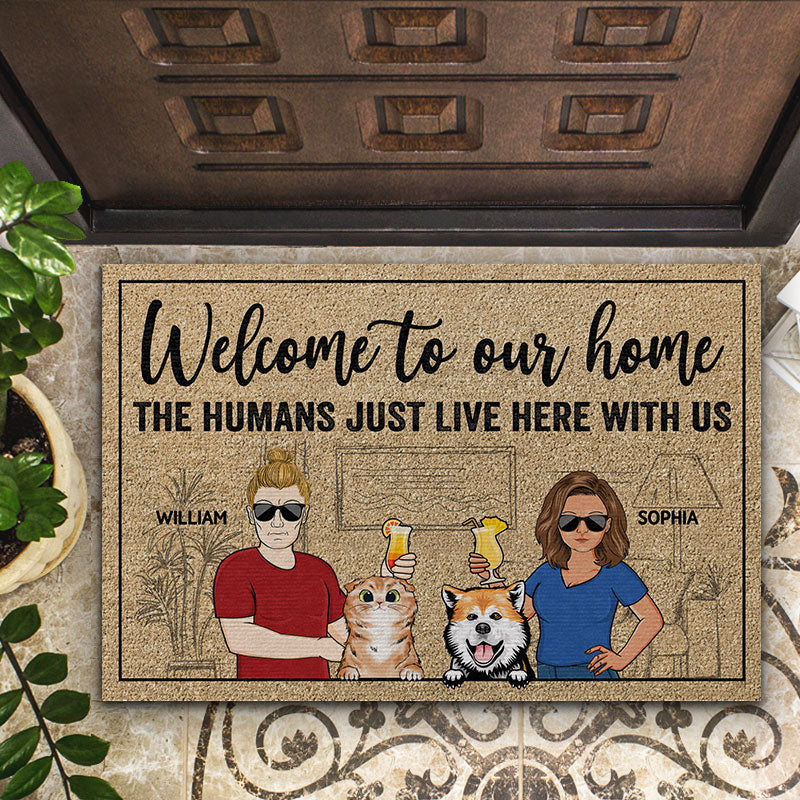 Welcome To Our Home The Humans Just Live Here With Us Couple Husband Wife Family - Gift For Dog Lovers & Cat Lovers - Personalized Custom Doormat