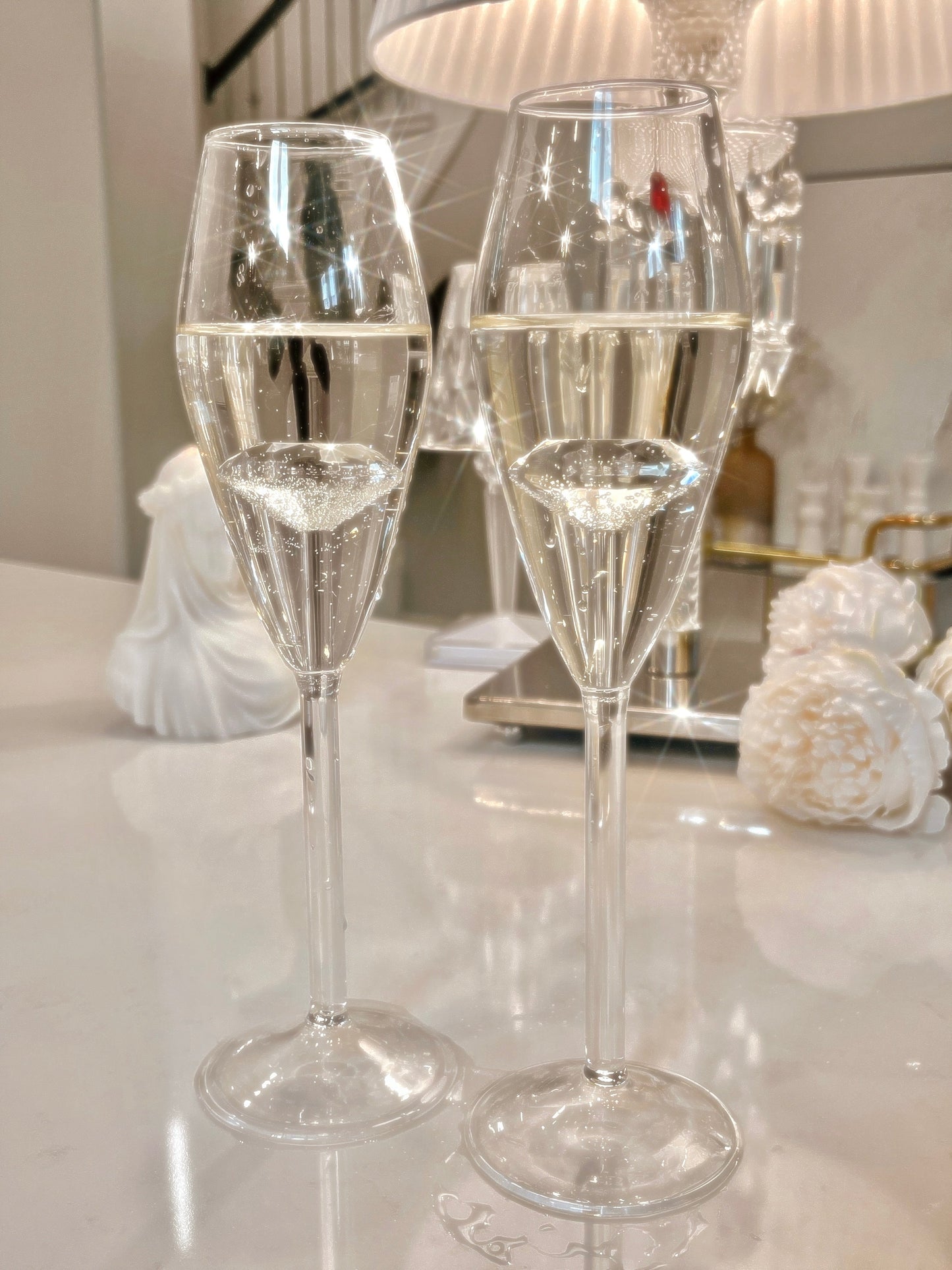 ‘100-Carat’ Diamond Champagne Flute Set of 2 holding delicious blanc champagne.