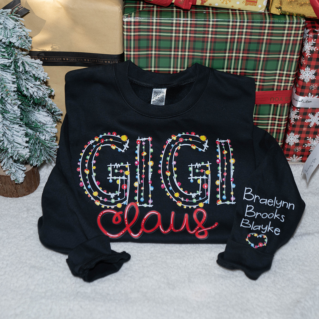 Gigi Claus Christmas lights And Grandkids Christmas Merry Sweatshirt